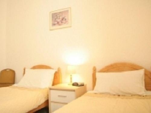 Twin Room with Private Bathroom